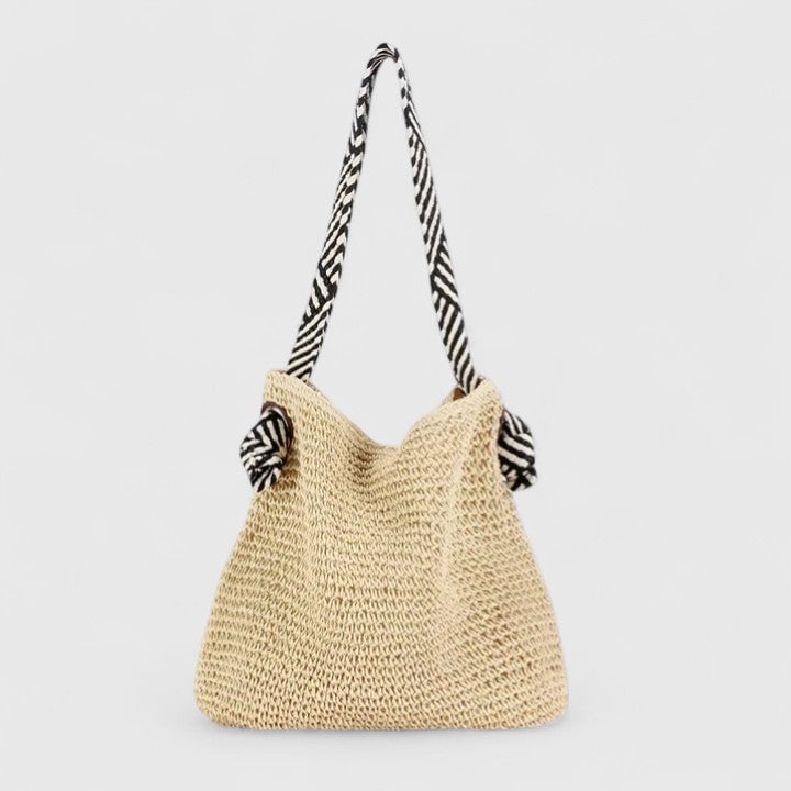 Both colorways of the bohemian braided shoulder bag, warm brown and natural beige, side by side