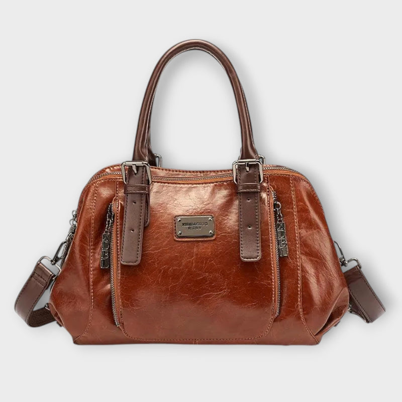 Side view of Eirunn classic handbag showing clean silhouette and elegant details