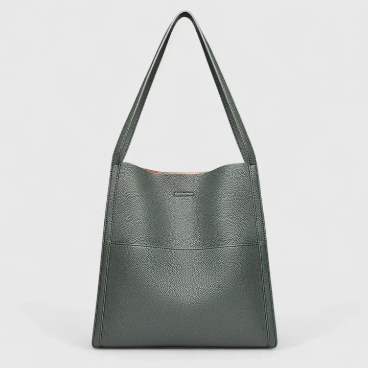 Close-up of Eirunn structured handbag hardware and strap detail