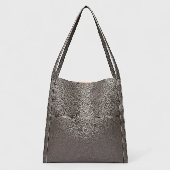 Eirunn structured handbag styled with a work outfit on a model