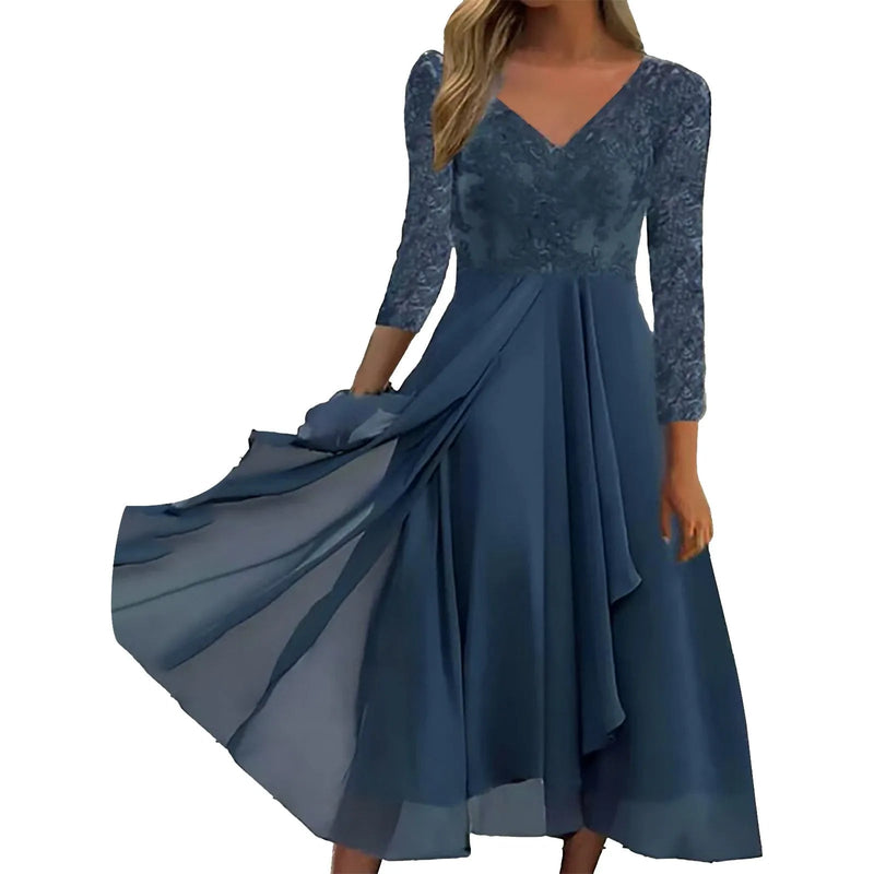 Model wearing the Elaine floral lace long dress in green, featuring a high elastic waist and flowing skirt with a delicate lace print