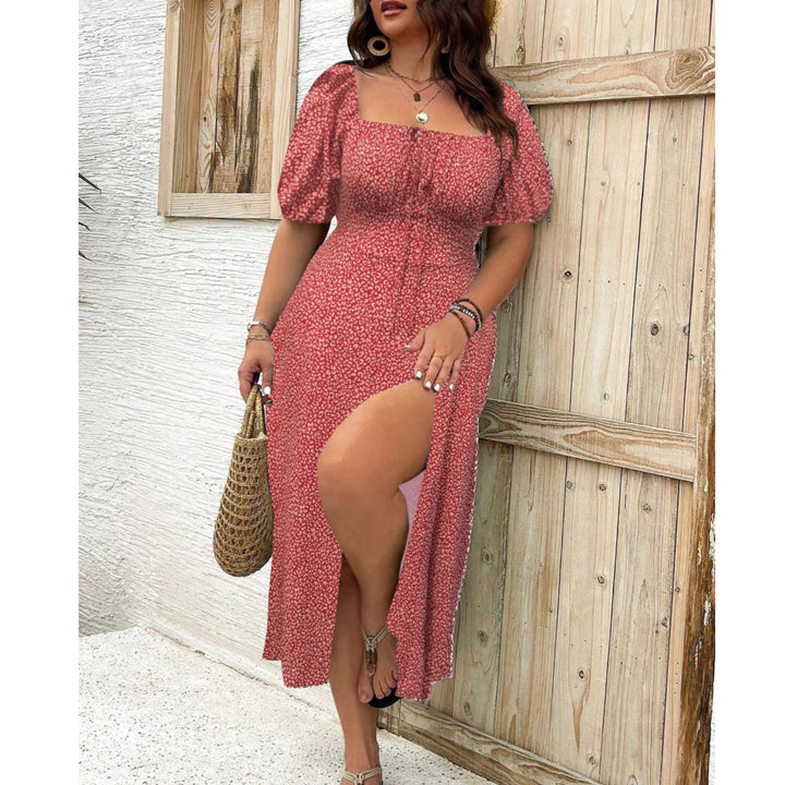 Full-length shot of a plus size puff sleeve maxi dress in red with elegant drape