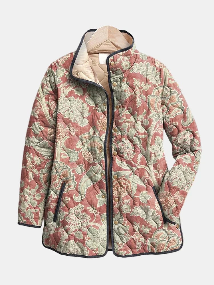 Woman wearing a lightweight vintage floral quilted jacket in a multicolor print with a relaxed, flattering fit