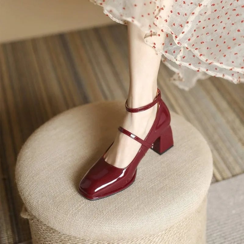 Celeste black patent ankle strap block heel mary jane pump, front three-quarter view