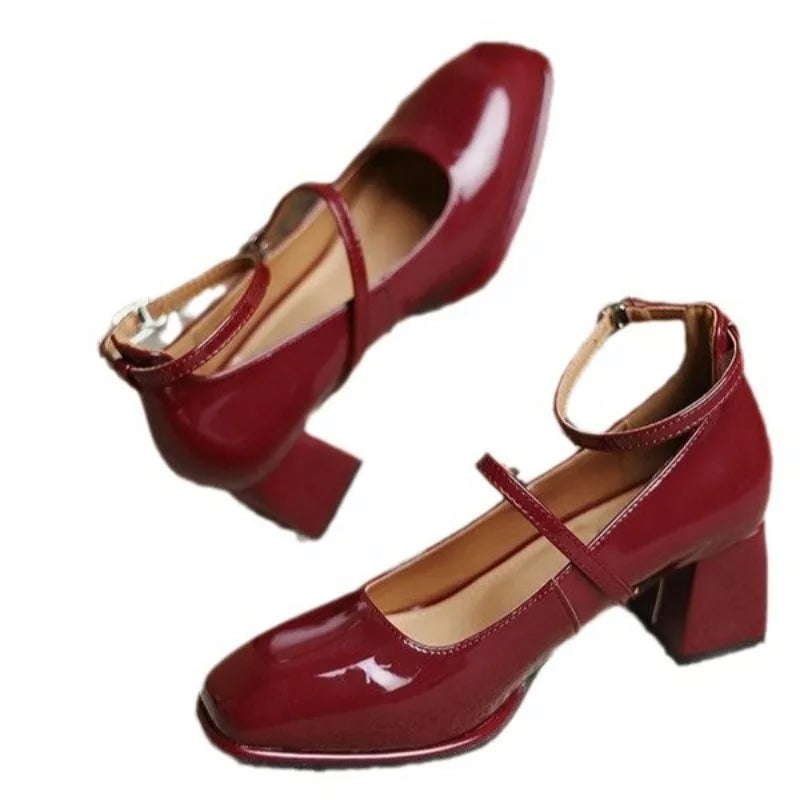 Celeste burgundy patent ankle strap block heel mary jane pump, front three-quarter view