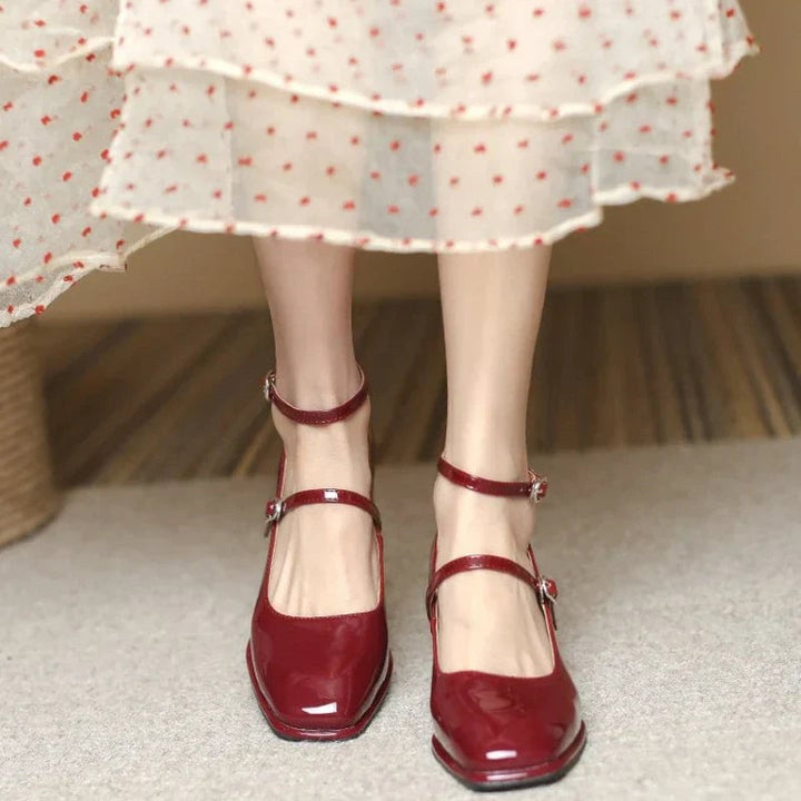 Celeste burgundy mary jane pump showing square toe and polished ankle strap buckle