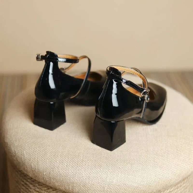 Celeste burgundy ankle strap pump side profile showing block heel and patent finish
