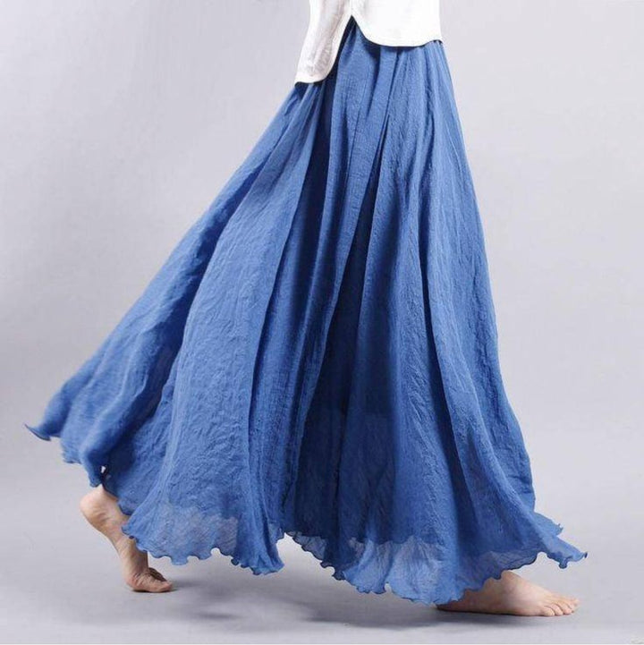 Close-up detail of the Eliana flowy skirt fabric texture and waistband construction