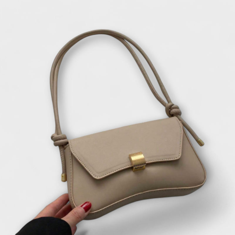Elida minimalist shoulder bag in terracotta shown from the front against a clean background