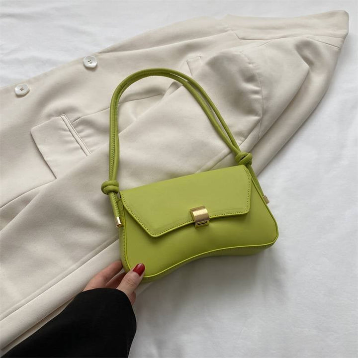 All three Elida shoulder bag colorways — terracotta, beige, and green — arranged together