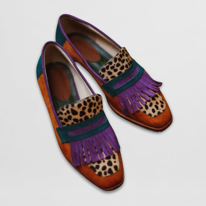 Elise leather loafers in brown styled with tailored trousers for a polished everyday look