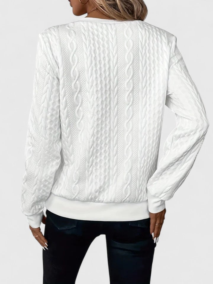 Three color options of the Elise sophisticated sweater — White, Gray, and Black — displayed together