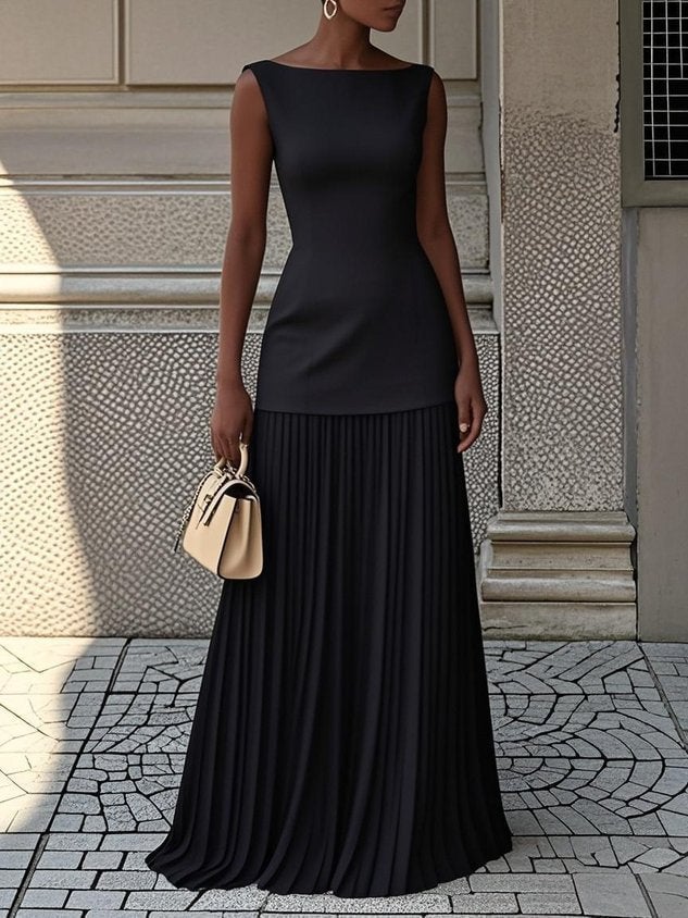 Front view of the Eliza sleeveless pleated maxi dress showing the figure-enhancing bodice