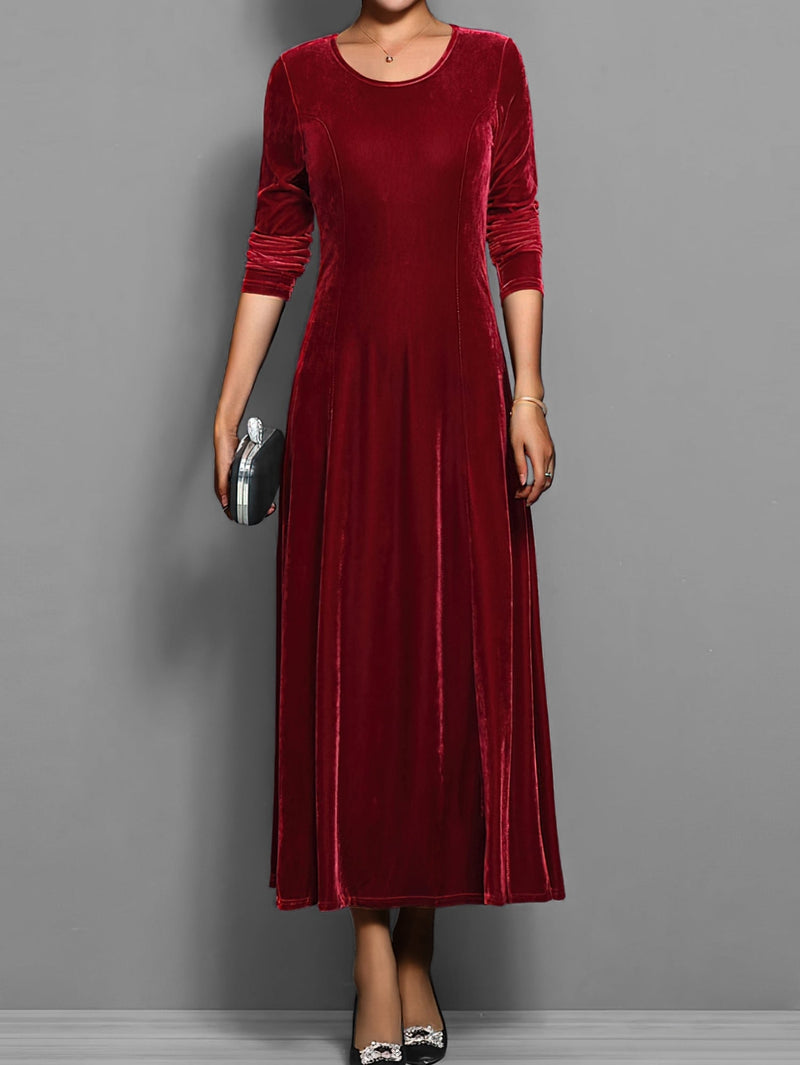 Front view of the Elizabeth velvet dress showing the fitted bodice and flowing A-line skirt