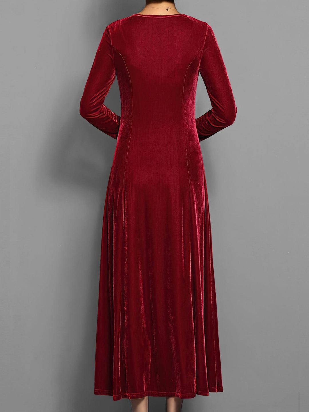 Side profile of model in the Elizabeth soft velvet dress highlighting the graceful drape