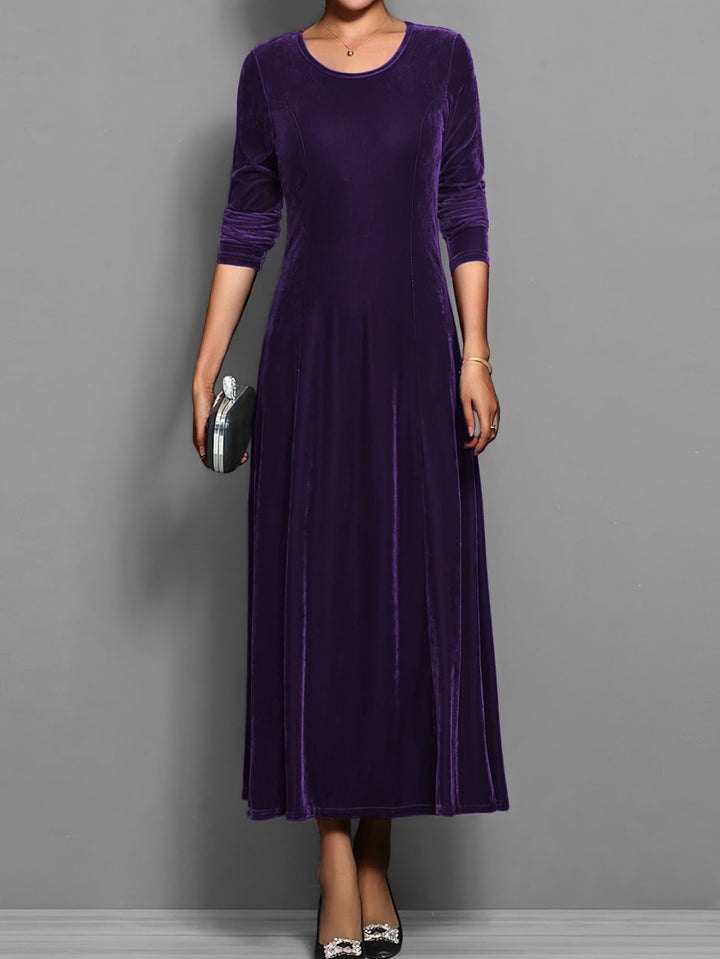 Detail shot of the classic scoop neckline on the Elizabeth soft velvet dress
