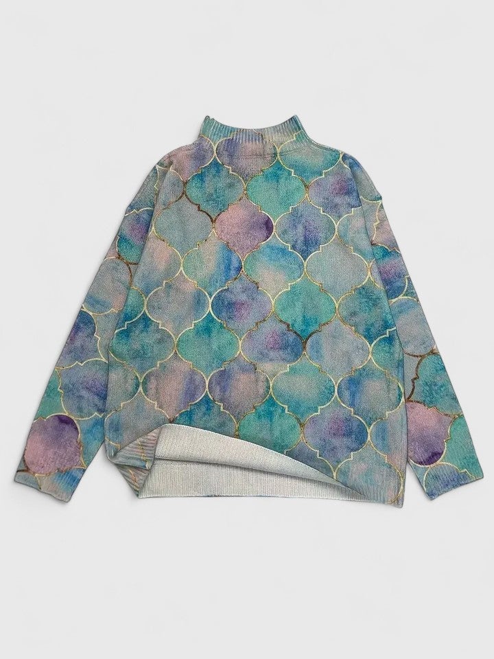 Close-up detail shot of the Elizabeth sophisticated sweater showing soft fabric texture and refined finish