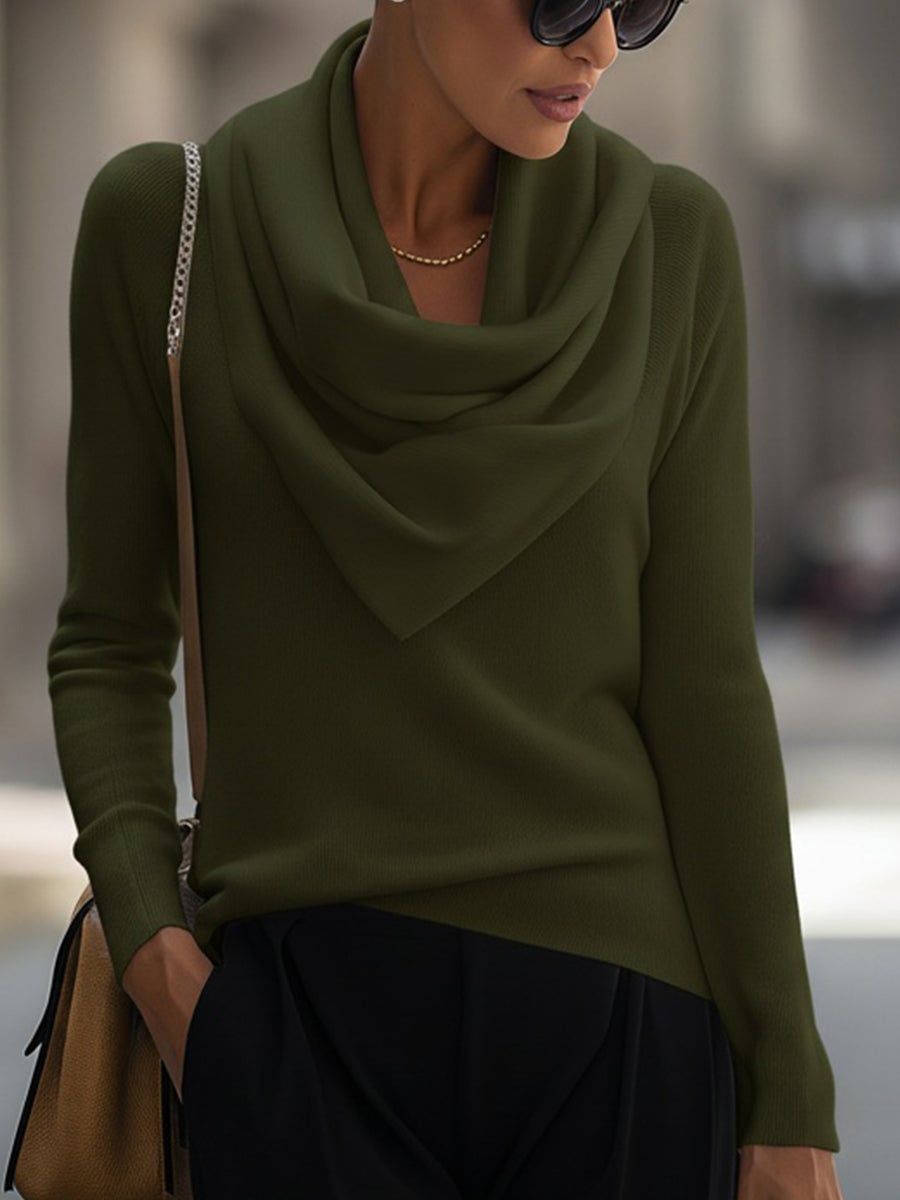 Olive green draped cowl neck top styled with denim for a casual everyday look