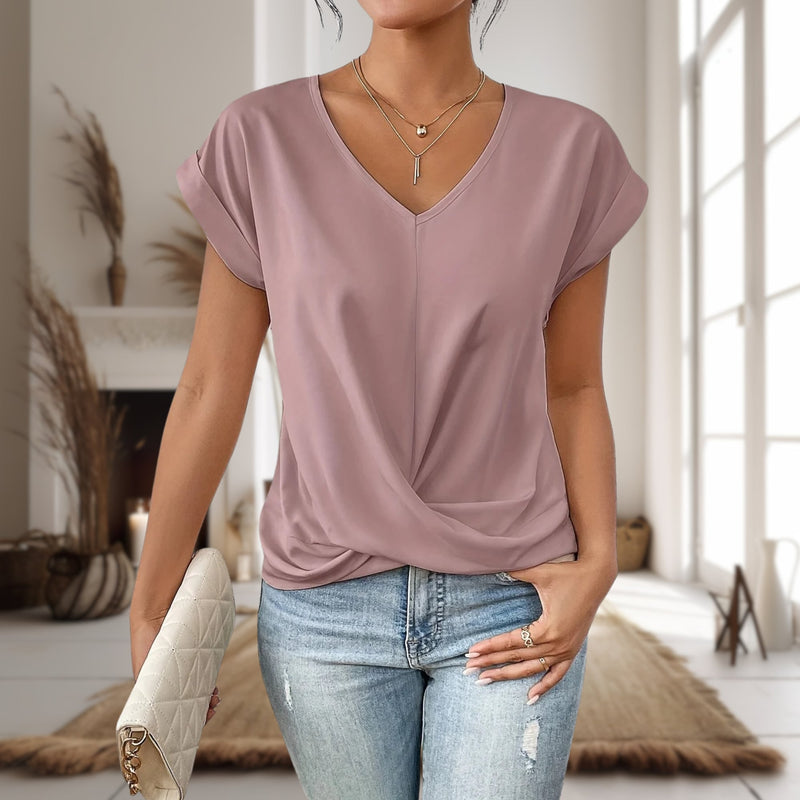 Close-up of sweetheart neckline detail on a soft, lightweight women's t-shirt in pink