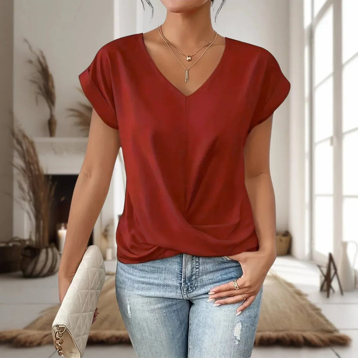 Front view of a white sweetheart neck t-shirt showing the light stretch and tailored silhouette