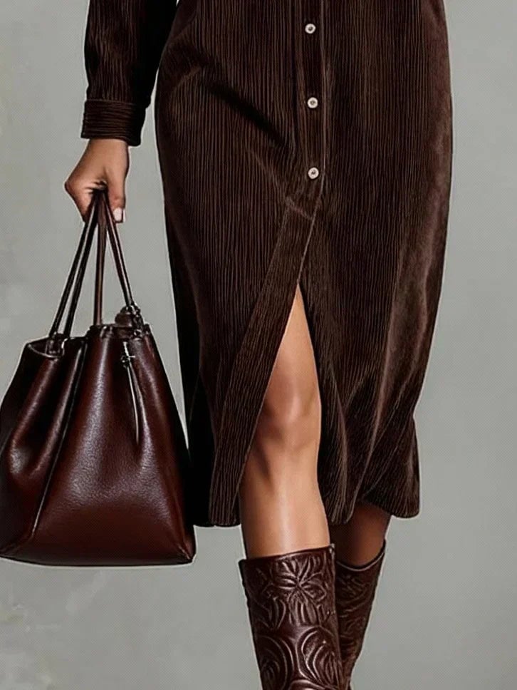 Detail shot of the lightweight fabric and flared hem on the brown Elle dress