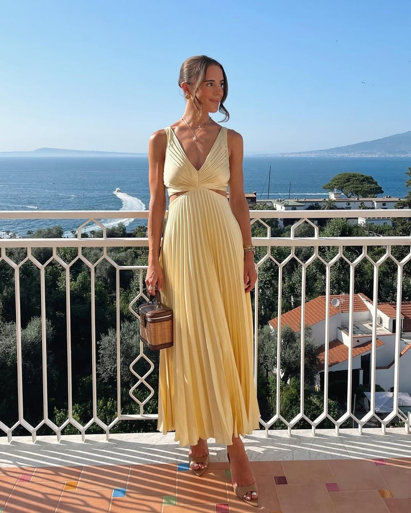 Front view of the Elle yellow maxi dress showing the flattering V-neckline and floor-length cut