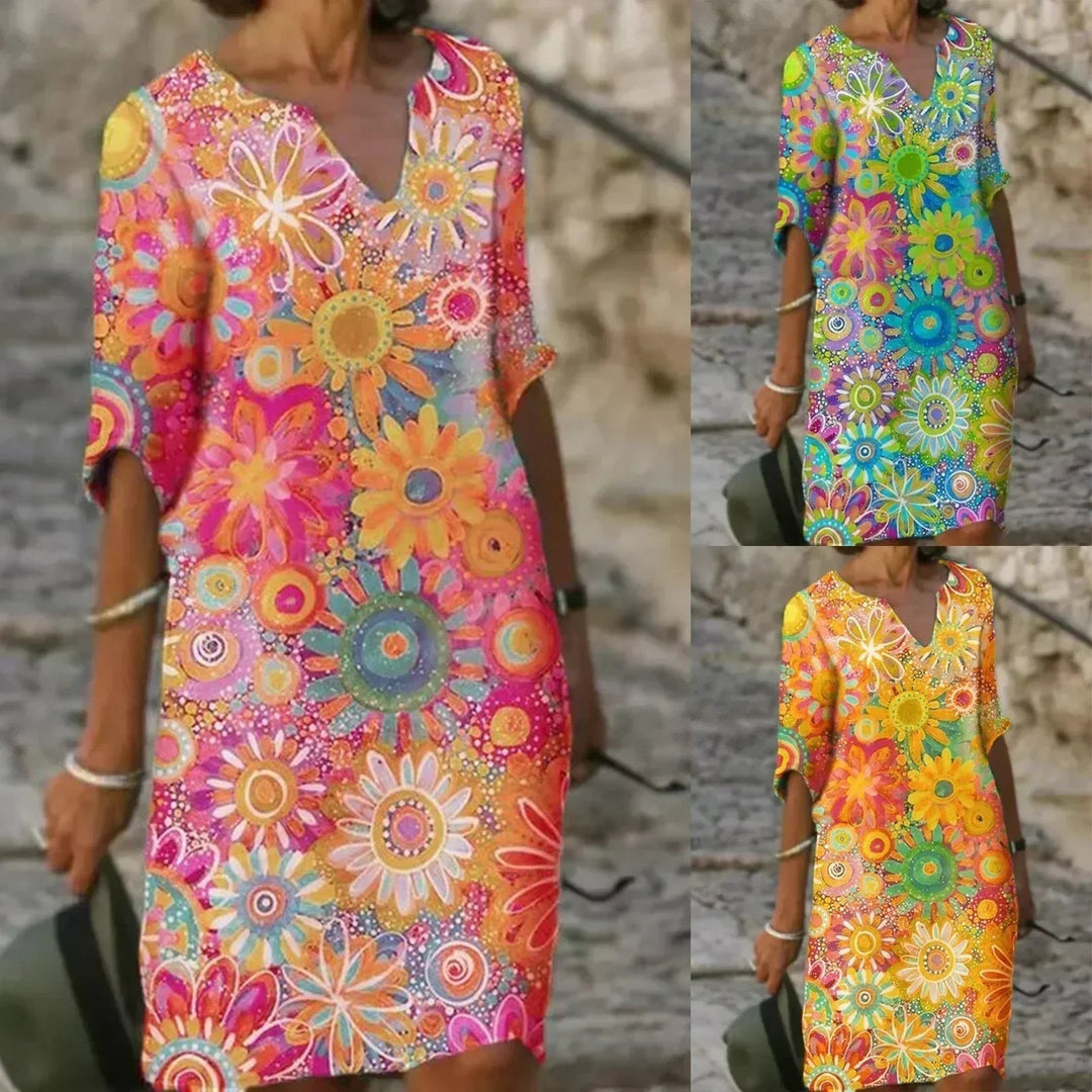 Close-up detail of the Ellery dress floral print and lightweight breathable fabric in a soft pink colorway