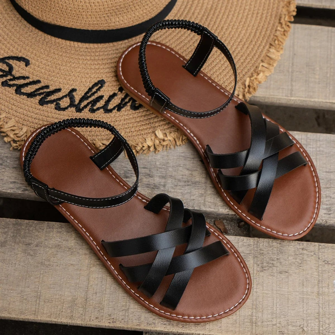 Ellery adjustable sandals in white on a light background highlighting strap detail