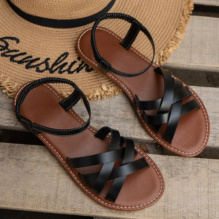 Ellery adjustable sandals in white on a light background highlighting strap detail