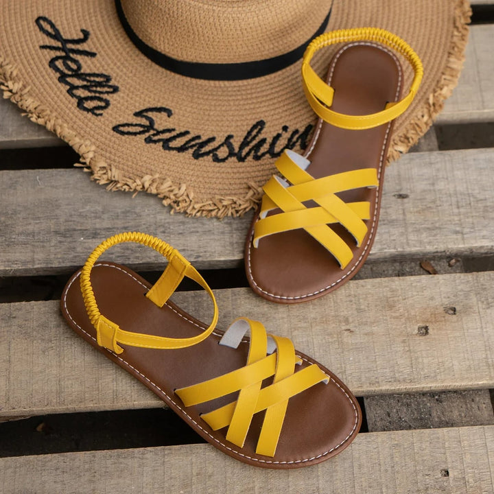 Close-up of Ellery sandal cushioned footbed and secure adjustable strap closure