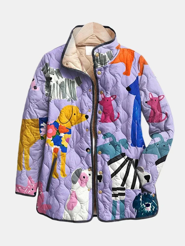 Woman wearing a lightweight multicolor quilted jacket with an all-over dog print design, relaxed fit, shown from the front