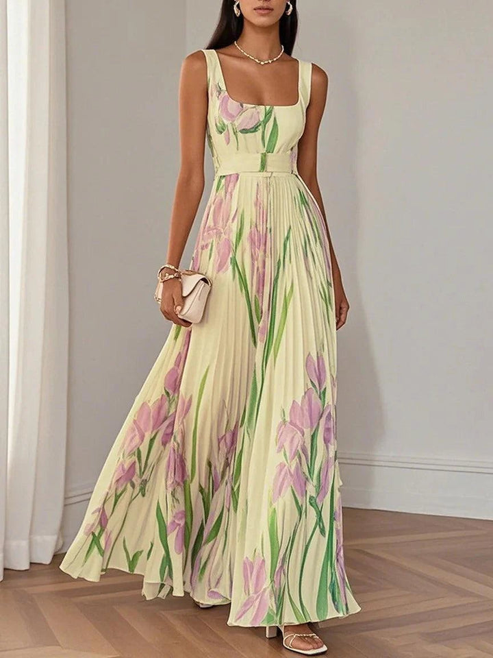 Side view of white A-line chiffon maxi dress showing flowing skirt