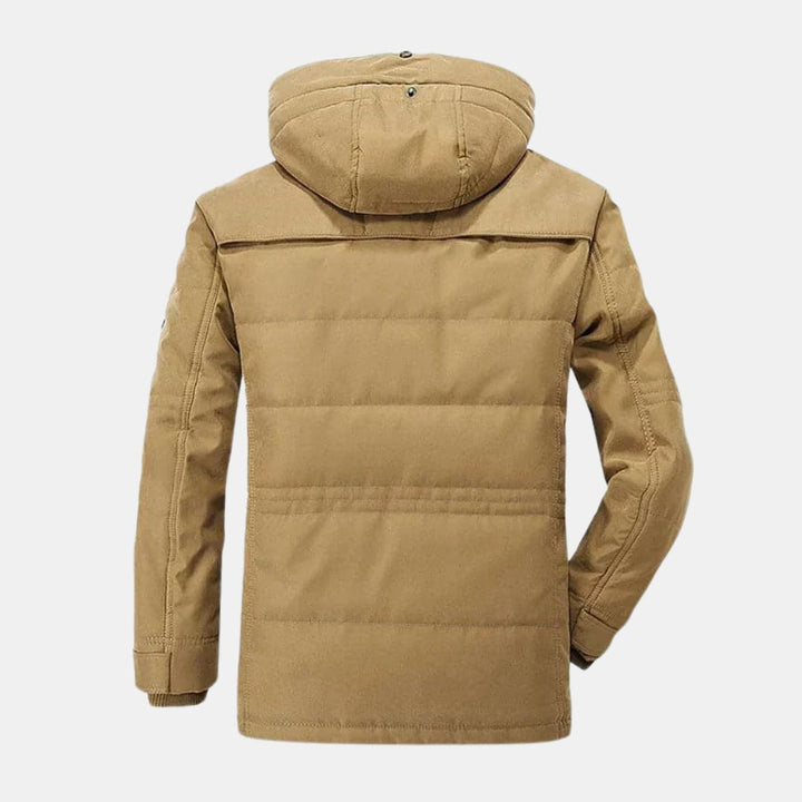 Ellis lined winter jacket in brown worn outdoors highlighting wind and water resistant exterior