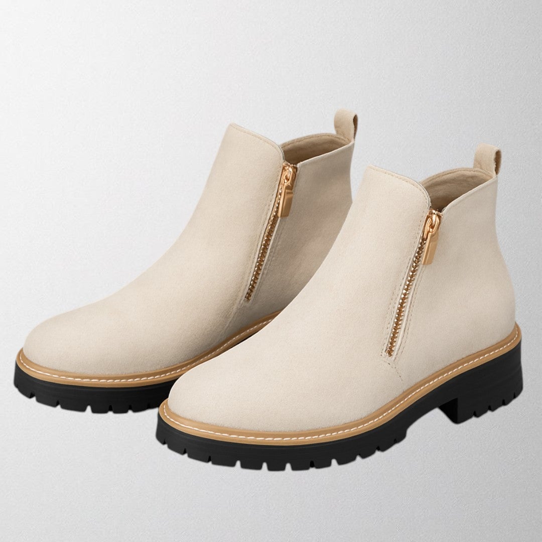 Elma women's side-zip shoe shown from the back to highlight the zip placement and heel shape