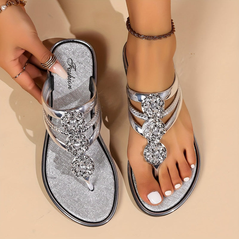 Eloira glam rhinestone sandals in silver with sparkling crystal-embellished straps on a light background