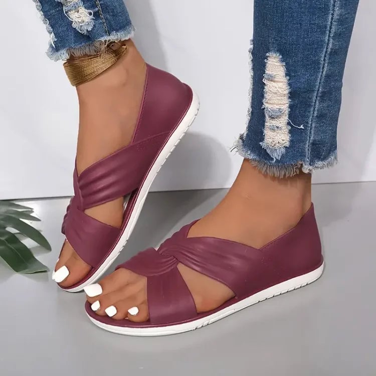 Eloise sandals in pink worn on a model's feet