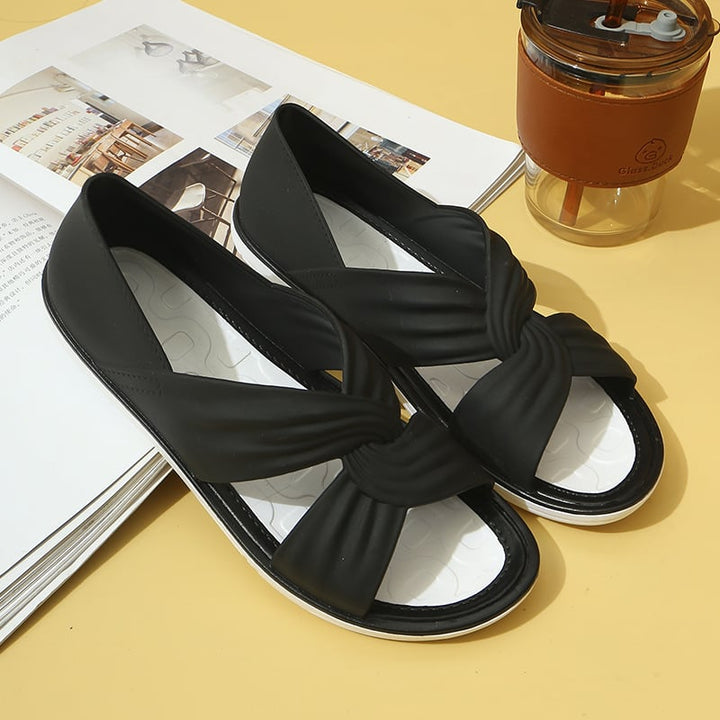 Pair of Eloise sandals in purple showing secure strap fit