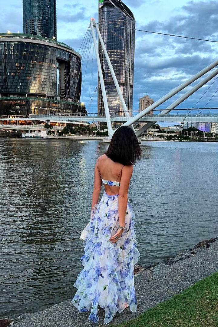 Overhead flat-lay of the Eloise blue floral lace maxi dress showing full silhouette