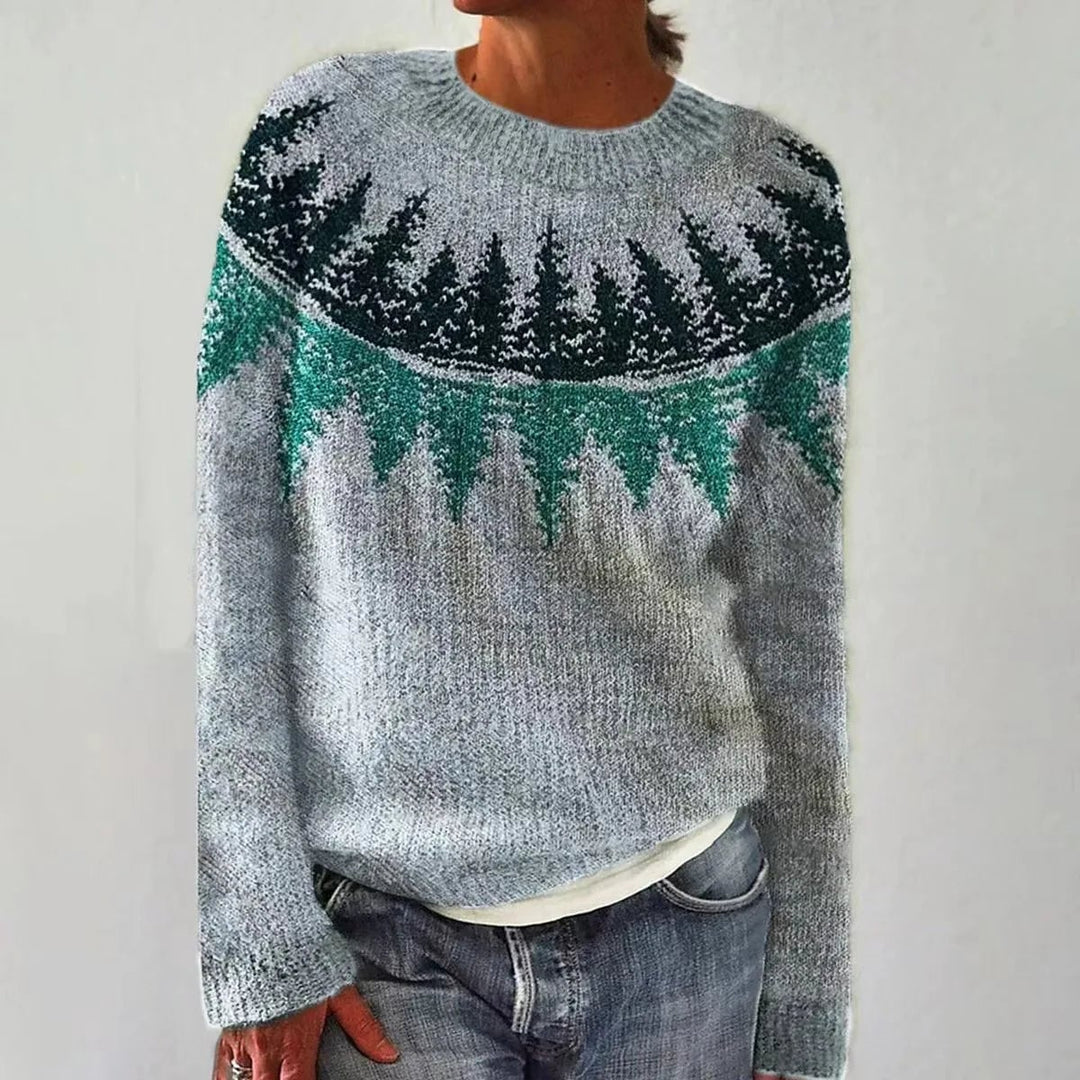 Elora sweater in blue and pink colorway laid flat showing overall shape and length