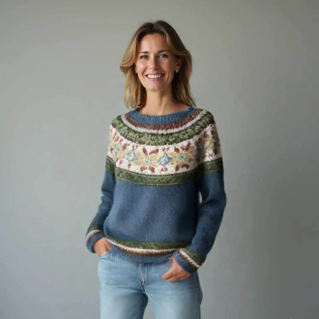 Model wearing the Elora sweater in grey with stars pattern layered over a collared shirt