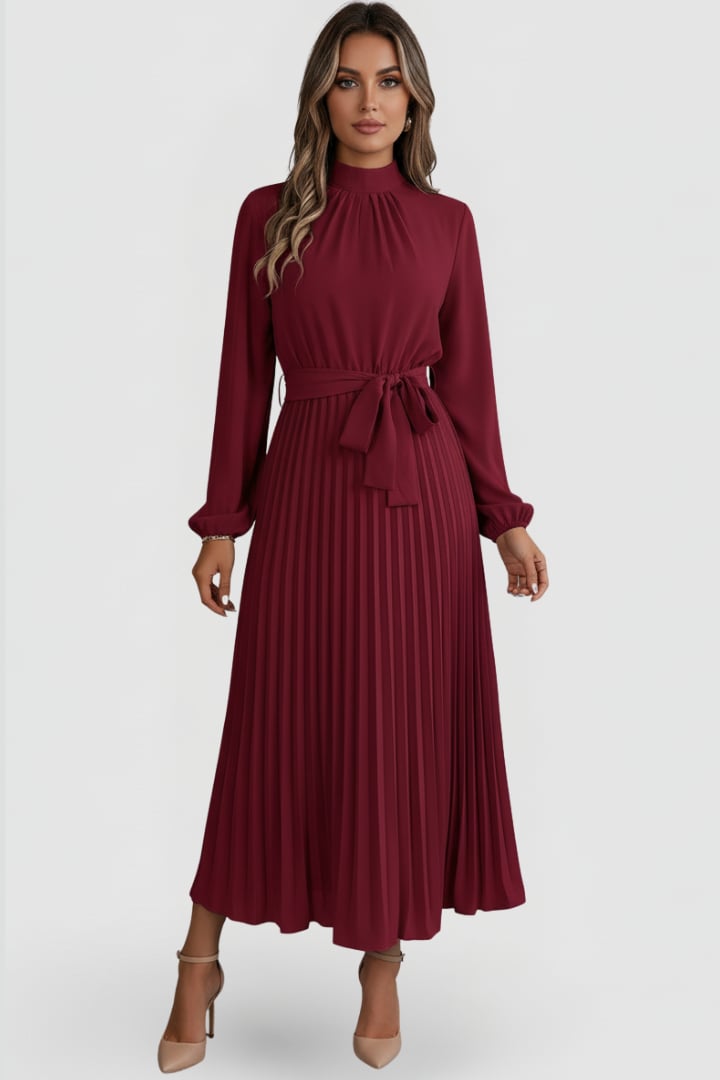 Close-up of pleated skirt detail on Elowen midi dress in Khaki