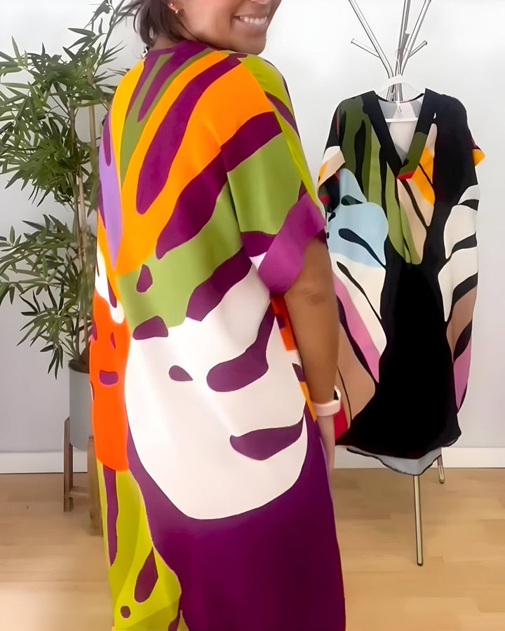 Lifestyle shot of the Elsie summer dress worn outdoors on a sunny day, paired with minimal accessories