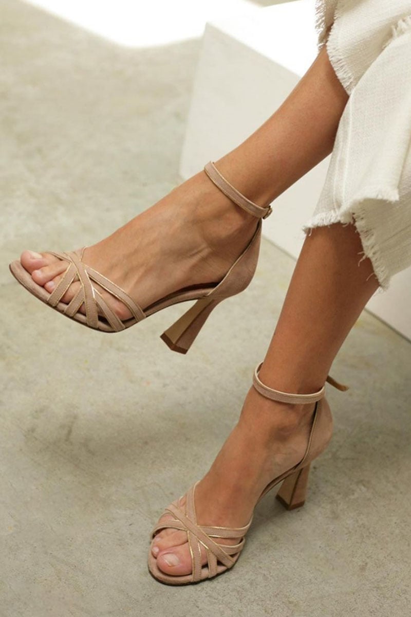 Brown patchwork peep-toe low heels with an open toe and artistic paneled upper, shown from a front three-quarter angle