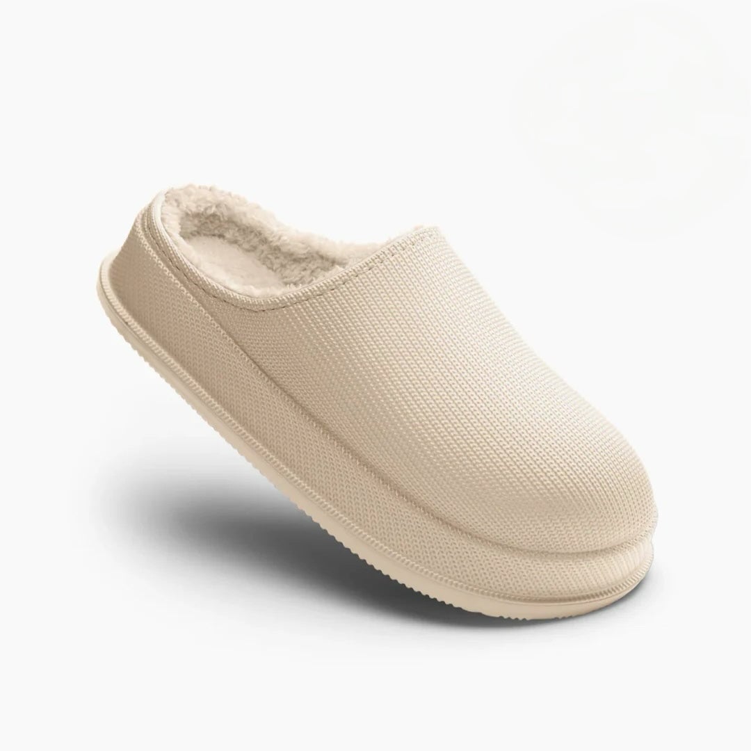 Ember women's comfort sandals shown in beige colorway, side profile view