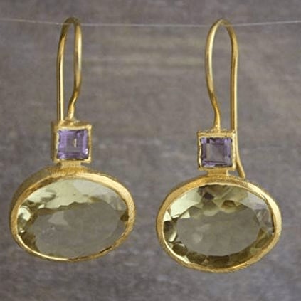 Vintage-style green crystal gold drop earrings with faceted emerald-toned stones and warm gold-tone setting