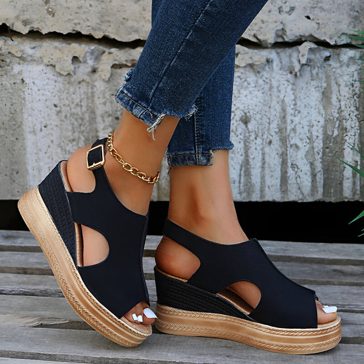 Close-up of Emerson orthopedic sandal Black colorway highlighting cushioned sole and secure strap closure