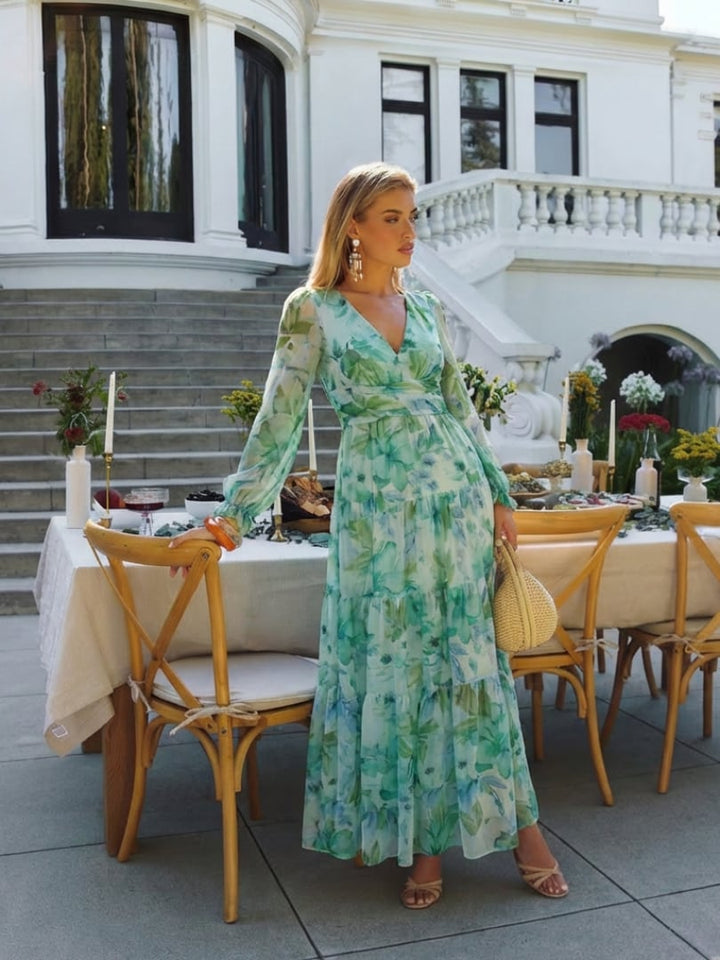 Flat lay of the Emilia floral maxi dress showing full print and silhouette