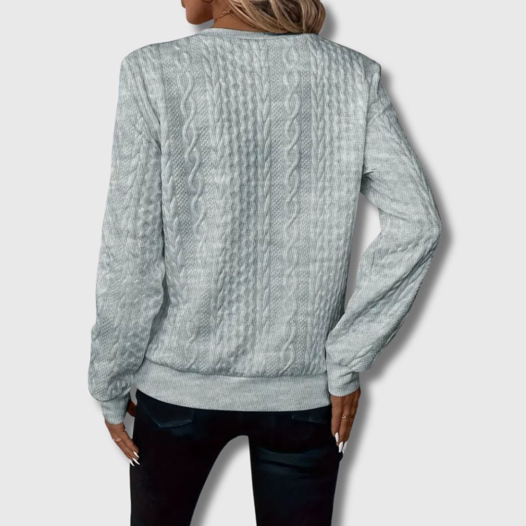 Emily elegant sweater in pink styled casually with denim for a chic weekend outfit