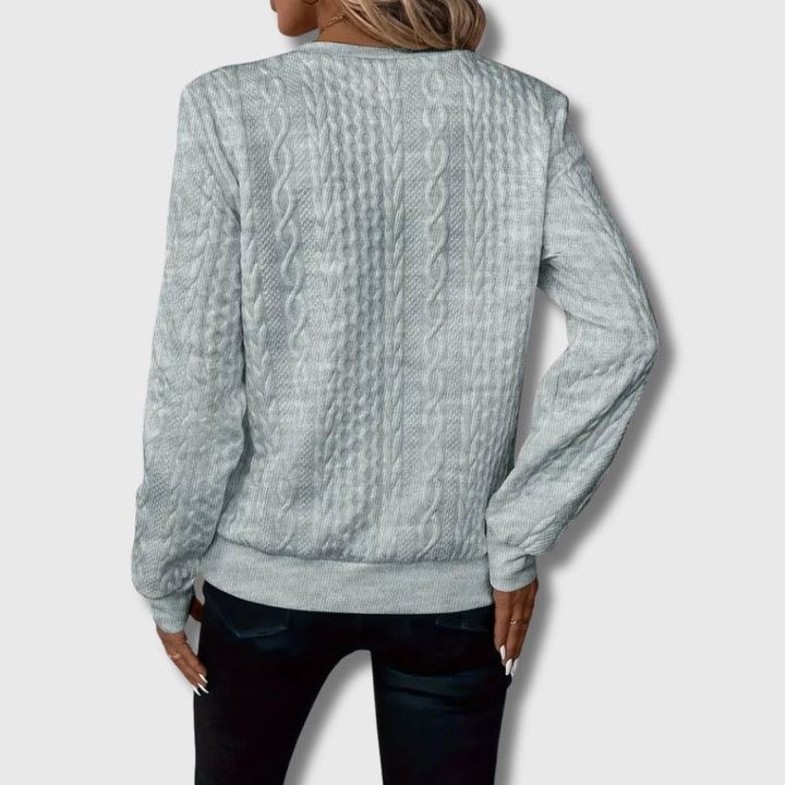 Emily elegant sweater in pink styled casually with denim for a chic weekend outfit