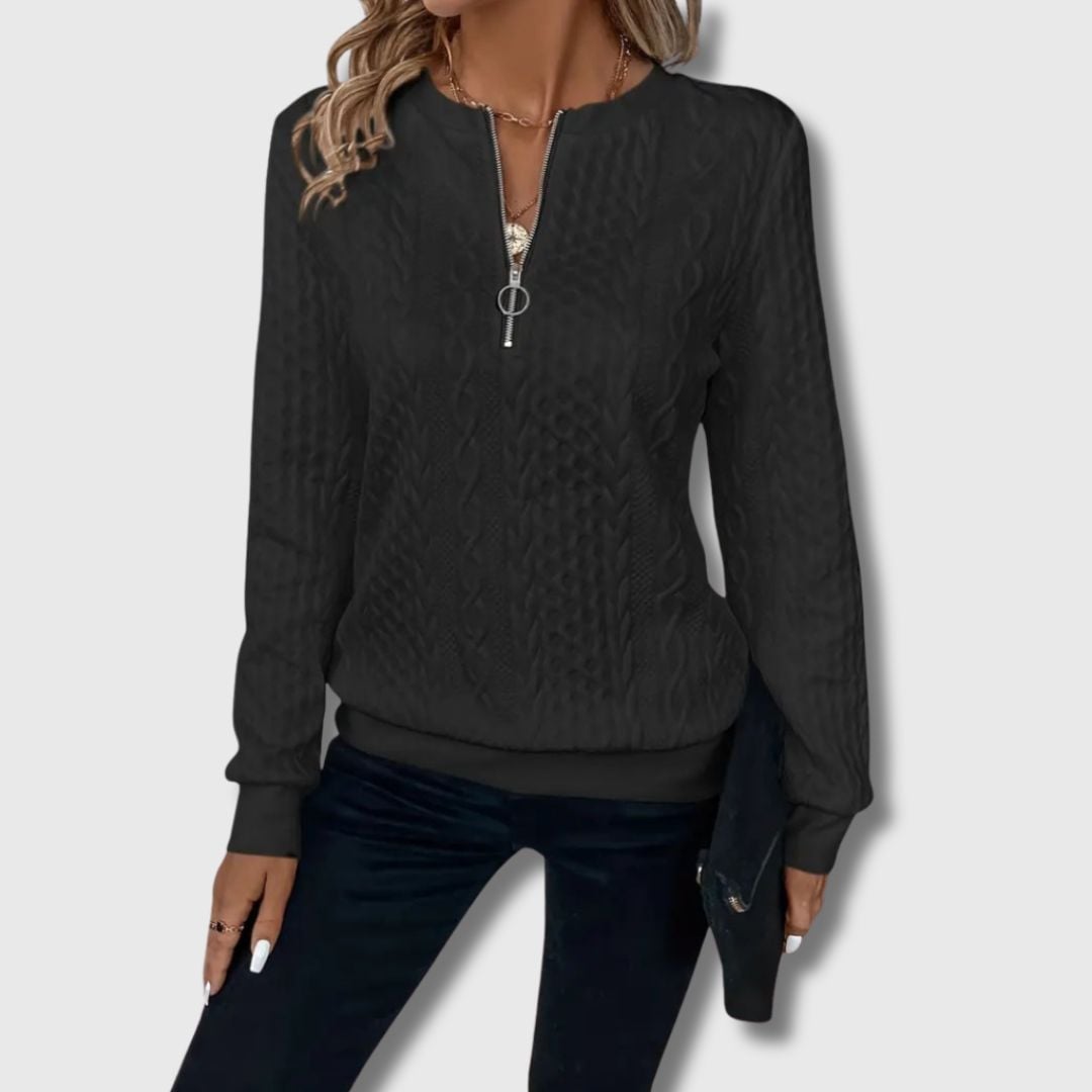 Emily elegant sweater in black worn as a versatile layering piece for a sophisticated look